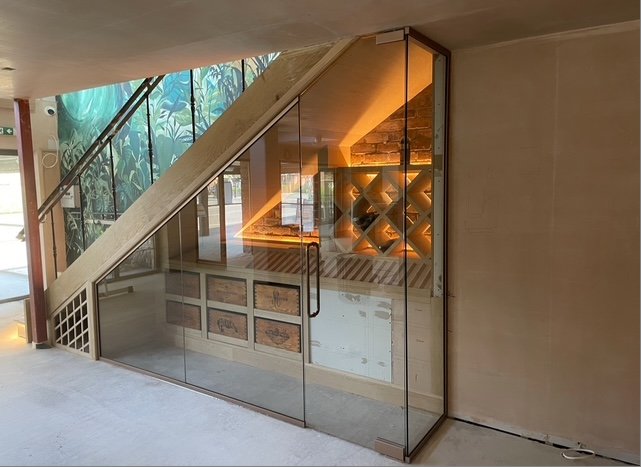Under stairs glass enclosure